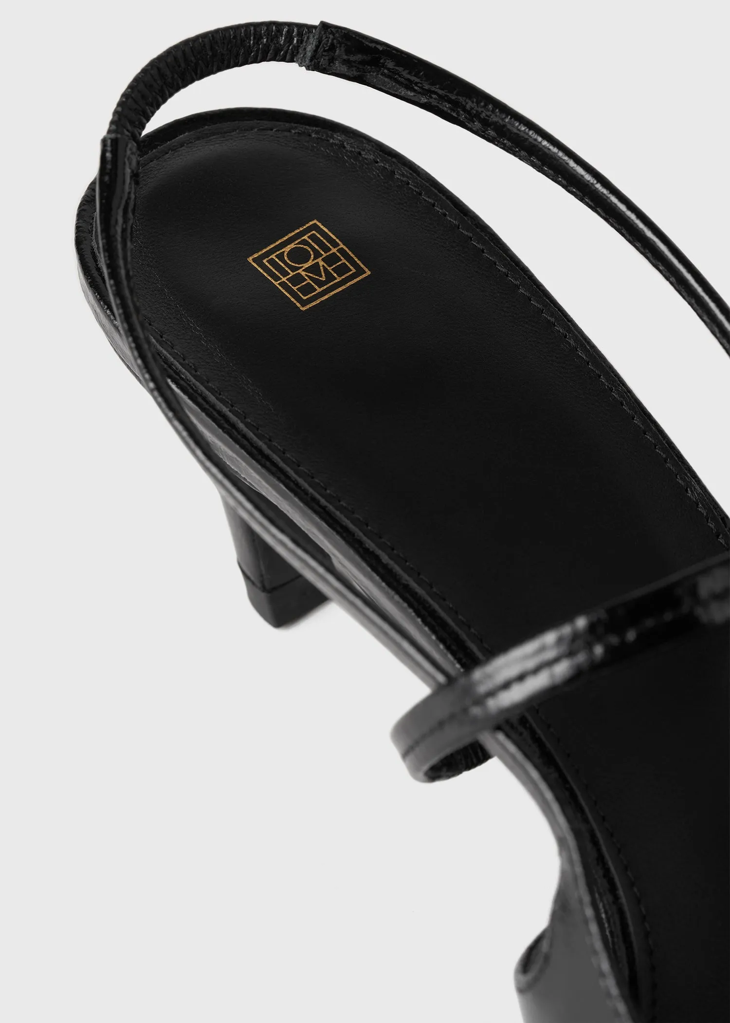 Sharp patent slingbacks black